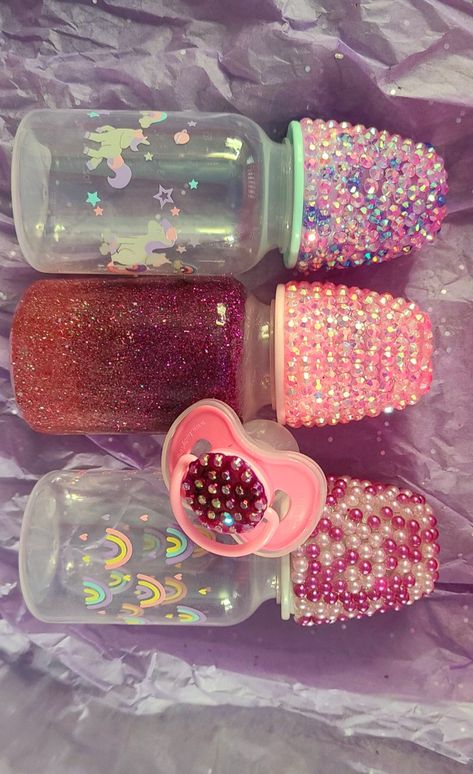 Baby bottles with bling and a pacifier with bling Bling Baby Shower, Bling Pacifier, Barbie Gifts, Bling Ideas, Girls Party Favors, Rhinestone Crafts, Bling Crafts, Mommy Goals, Baby Bling