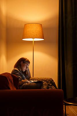 Danil Nevsky | Stock Photography Portfolio | Stocksy United Bored Women, Bored At Home, Bed Lamp, Person Sitting, Kids Reading, Photography Portfolio, Stock Photography, Mood Board, Novelty Lamp