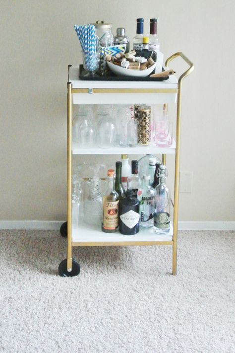 static.squarespace Ikea Utility, Ikea Utility Cart, Bar Cart Hack, Ikea Bar Cart, Mini Bar At Home, Metallic Gold Spray Paint, Ikea Bar, Ikea Raskog, Diy Bar Cart