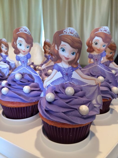 My version of the Sofia the first cupcakes. I made an American buttercream frosting from scratch because I had read it holds up better for decorating and it was Ahmazing!!! I'll never buy a can of frosting again. This was a fun pin to recreate Sophia The First Cupcakes, Sofia The First Cupcakes, Princess Sofia Cupcakes, Sofia Cupcakes, Frosting From Scratch, Sofia Birthday Cake, Sofia The First Birthday Cake, American Buttercream Frosting, Sofia The First Cake