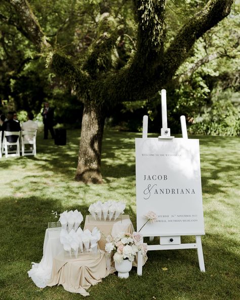 That petal toss moment after you say ‘I do’ is so iconic! We offer petal stations that sit perfectly next to your welcome sign to greet guests as they enter your ceremony space. The cones come in lots of 25- so you can choose how many you think you’ll need! Or maybe you don’t need any cones! You just want a big ol’ basket of delicate petals that guests can grab from- we can do that too! We can clean up the beautiful mess afterwards too 😉 Photography by @anelloweddings ✨ Petal Station Wedding, Pedal Toss Wedding, Petal Toss Station, Petals Down The Aisle, Petal Toss Wedding, Petal Cones, Petal Toss, Wedding Ceremony Signs, Your Welcome