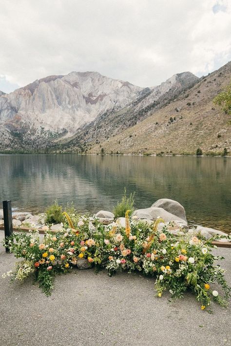 Ceremony ground arch at Convict Lake
#wedding #whimsical #romantic #ceremony
#ruffleeffect #mammoth Convict Lake Wedding, Grounded Wedding Arch, Ceremony Ground Florals, Ceremony Ground Arch, Floral Ground Installation, Wedding Ceremony Flowers On Ground, Ground Florals Wedding Ceremony, Ground Arch Wedding, Ground Floral Arch