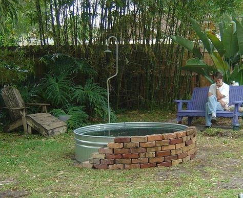 Brick enclosure around galvanized goldfish pond almost done. Galvanized Water Trough, Fire Pit Materials, Goldfish Pond, Building A Pond, Modern Fire Pit, Water Trough, Fountains Backyard, Stone Fire Pit, Natural Pond