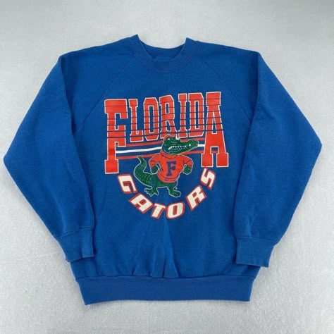 Vintage Ncaa Florida Gators Mascot Sweatshirt, University Of Florida Sweatshirt Sweatshirt Product Details: - 8 Oz; 50% Cotton/50% Polyester - Air Jet Yarn For A Softer Feel And No Pilling - 1x1 Athletic Rib Cuffs And Waistband With Spandex; Double-Needle Stitching - Decoration Type: Digital Print - Other Colors And Styles Are Available By Request -Care Instructions-- Wash Item Inside Out In Cold Water, Do Not Bleach, Do Not Dry Clean, Do Not Iron Directly On The Design. Tumble Dry Low. #Florida Florida Gators Hoodie, Florida Sweatshirt, Ohio State Sweatshirt, Cropped Half Zip, Cropped Crewneck, Columbus Blue Jackets, Striped Sweatshirts, University Of Florida, Quarter Zip Sweatshirt