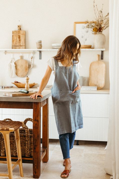 camille styles in casa zuma linen apron. Dinner For A Crowd, Crossback Apron, Wood Salad Bowls, Denim Apron, Table Throw, Artist Outfit, Handcrafted Ceramics, Handcrafted Wood, Linen Apron