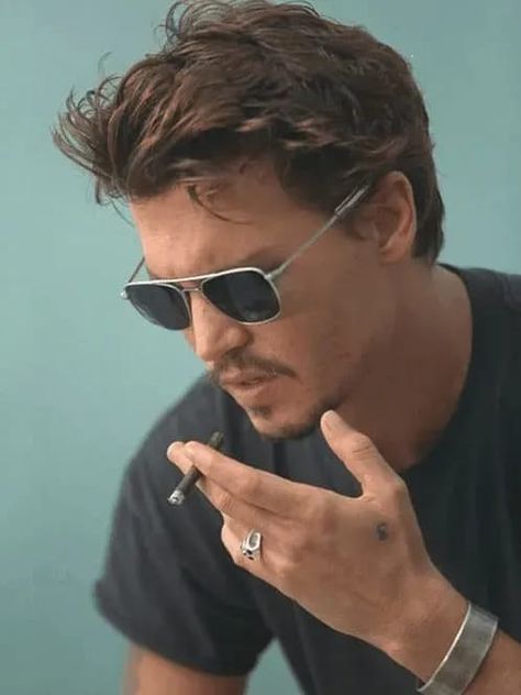 Most of us know Johnny Depp for his iconic roles in Edward Scissorhands, Pirates of the Caribbean, Public Enemy, and many more. It’s clear he can change his look for any character, and so Johnny depp hairstyle may have become just as popular as the actor himself. If you want to rock Johnny Depp’s looks, you’ll need to know the right way to trim and cut your locks, but there’s also different hair products that make it easier to achieve those tousled long locks or slicked back styles. Johnny Depp Haircut, Johnny Depp 90s, Johnny Depp Hairstyle, جوني ديب, Johnny Depp Style, Kaptan Jack Sparrow, Young Johnny Depp, Johnny D, Mens Hairstyles Medium