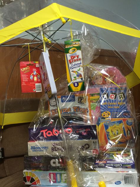 Rainy day basket. Spring fling 2015 Rainy Day Gift Basket Ideas, Rainy Day Raffle Basket, Rainy Day In The City, Signature Ideas, Spring Fling, Dry Erase, Tao, Rainy Day, Gift Baskets