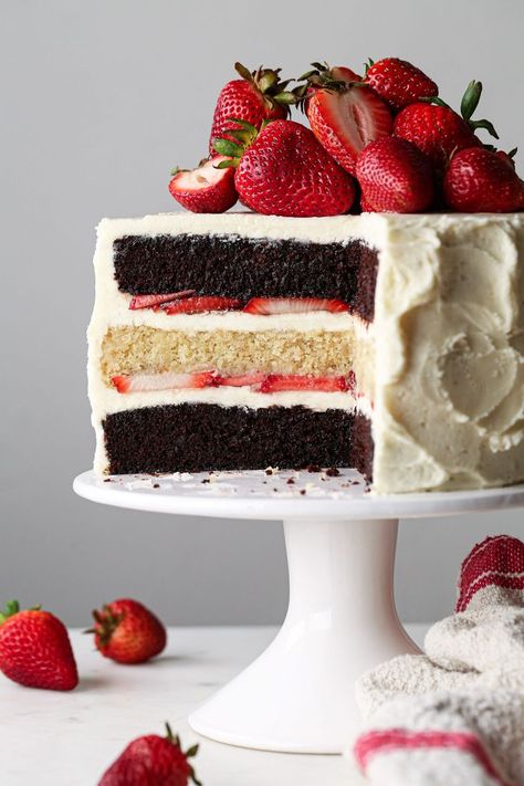 This Neapolitan layer cake combines the delicious flavors of vanilla, chocolate, and strawberry! Vegan friendly with a gluten free option! Chocolate Vanilla Strawberry Cake, Chocolate Cake With Fresh Strawberries, Chocolate And Vanilla Layer Cake, Chocolate Strawberry Wedding Cake, Chocolate And Vanilla Cake Layer, 2 Layered Cake, Neapolitan Desserts, Vanilla Strawberry Cake, Chocolate Cake With Strawberries