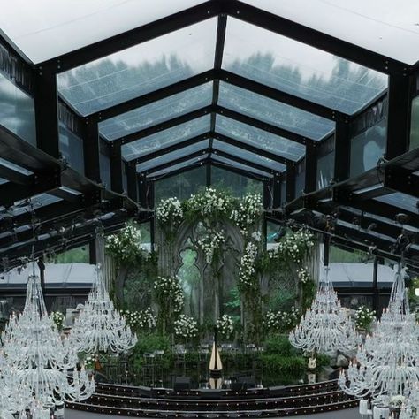 Rebecca Grinnals+Kathryn Arce on Instagram: "Cast your eyes upon Mother Nature’s Cathedral ⛪️🌲🤍 For our final feat of fantasy, @edlibbyevents took a clearing that surrounded the resort and transformed it into an enchanted forest (using real-life magic, of course). 🪄 After planting nearly 200 mature trees and 800 plants with cranes and heavy machinery (thanks to @Nemacolin’s stellar horticulture team of nearly 70 associates, specialists, and arborists). Ed then brought the glass tent to life using greenery, white flowers, and silver details 🌿🩶 #engage24 

Host Property: @nemacolin 
Creative Director, Event Design & Floral: @edlibbyevents 
Live Entertainment / Immersive / Dancers / BoyBand / DJ: @ElanArtists
Art Direction, Branding, Gifting Curation & Paper: @tpddesignhouse
Event Planni Never Expect Anything, Dream Wedding Decorations, Pushing Boundaries, Never Expect, Heavy Machinery, Live Entertainment, Enchanted Forest, Mind Blowing, Design Floral