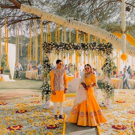 Dazzling Haldi Decor with hues of Yellow and White..  Decor + Design @cubeartweddings Wedding planner @jes_da_costa  Follow www.decorsutrablog.com for Ideas about Indian Wedding Decor  Email your original pictures to @decorsutrablog@gmail.com to get featured.  #wedmegood #weddingsutra #shaadisaga #shaadimagic #weddingz #WeddingInspiration #decoration #weddinginspo #instawedding #weddingflowers #haldiceremony #weddingreception #traditionalwedding #engagementdecor #weddingdetails #indianweddings # Lehenga Colours, Haldi Ceremony Decorations, Mandap Design, Mehendi Decor Ideas, Wedding Entrance Decor, Desi Wedding Decor, Mandap Decor, Wedding Planning Decor, Unique Wedding Decor