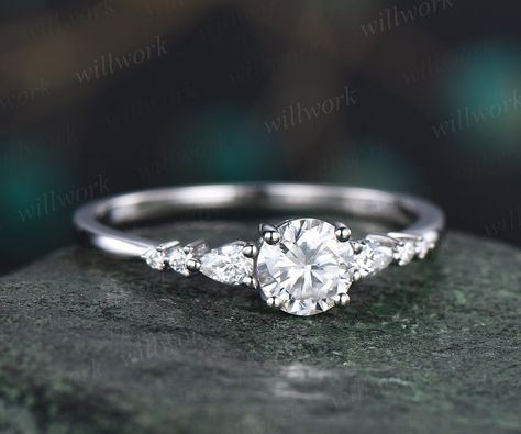 This ring is handmade by myself. The main stone in the picture is a 5mm round cut moissanite,about 0.5ct. The accent stones are diamonds or moissanites. The material is solid 14k gold(white,yellow,rose gold is also available) Ring size can be choose from the selection box. Matching band available: https://www.etsy.com/shop/willwork?section_id=20674906 This jewelry can also be made in solid 10k,14k,18k gold,with real diamonds.Contact me! Need rush order? contact me! Need custom making order? Cont Moissanite Silver Engagement Ring, Minimalistic Engagement Ring Silver, Dainty Silver Engagement Rings, Dainty Engagement Ring Silver, Simple Silver Engagement Rings, Minimalist Engagement Ring Silver, Snowdrift Ring, Vintage Moissanite Engagement Ring, Wedding Ring Women