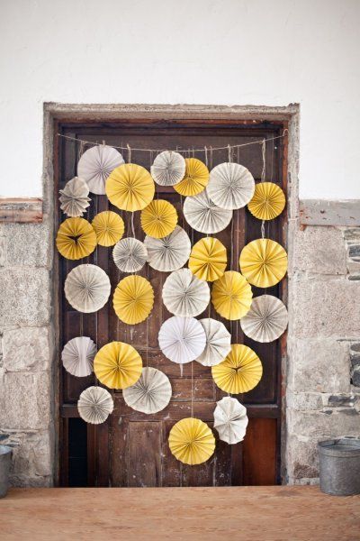 Decor. Paper fans strung on lines. Could add a lot of color to a reception. OR this would be fun to do in a kids room on the wall behind the bed or something. Paper Medallions, Pinwheels Paper, Deco Champetre, Massachusetts Wedding, Diy Photo Booth, בר מצווה, Safari Party, Coron, Paper Fans