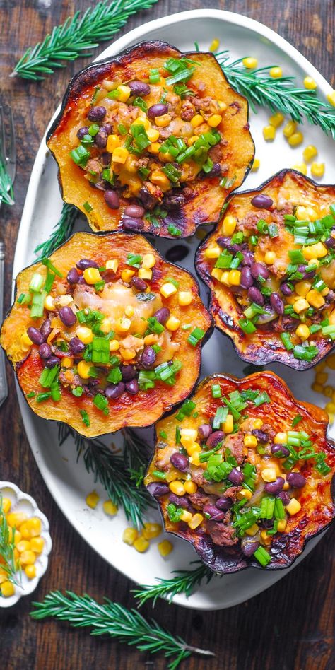 Ground Beef Stuffed Acorn Squash (Southwestern-style) on a white platter. Beef Stuffed Acorn Squash, Acorn Recipe, New Recipes For Dinner, Stuffed Acorn Squash, Acorn Squash Recipes, Green Chiles, Acorn Squash, Corn Kernel, Pepper Jack Cheese