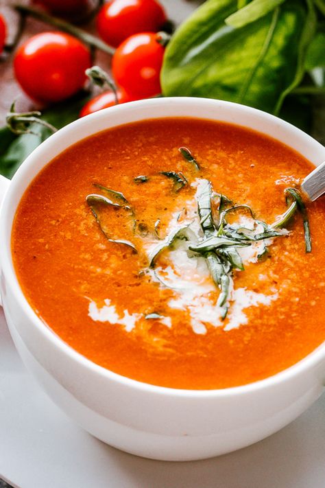 Get ready to enjoy our Roasted Tomato Soup, a great recipe that combines the rich flavors of roasted cherry tomatoes, fresh garlic, and fragrant basil into a creamy, comforting dish. Perfect for tomato season, this soup is bursting with fresh ingredients and flavor! #tomatosoup #roastedtomatosoup Tomato Soup Healthy, Roast Tomato Soup Recipe, Tomato Soup Grilled Cheese, Soup Store, Oven Dried Tomatoes, Soup Starter, Weekly Menu Plan, Bisque Soup, Tomato Bisque