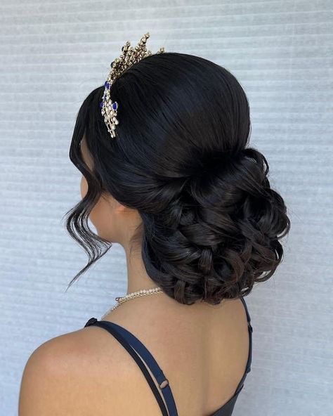 Regal Crown Hairstyles to Inspire You Quinceanera Hair Updo, Updo Quince Hairstyles, Sweet 16 Updo Hairstyles With Tiara, Hair Updos For Quinceanera, Quinceanera Hairstyles Bun With Curls, Bun Hairstyles For Quince, 15 Hair Quinceanera Bun, Hair Up Quinceanera Hairstyles, Low Bun Quince Hairstyles