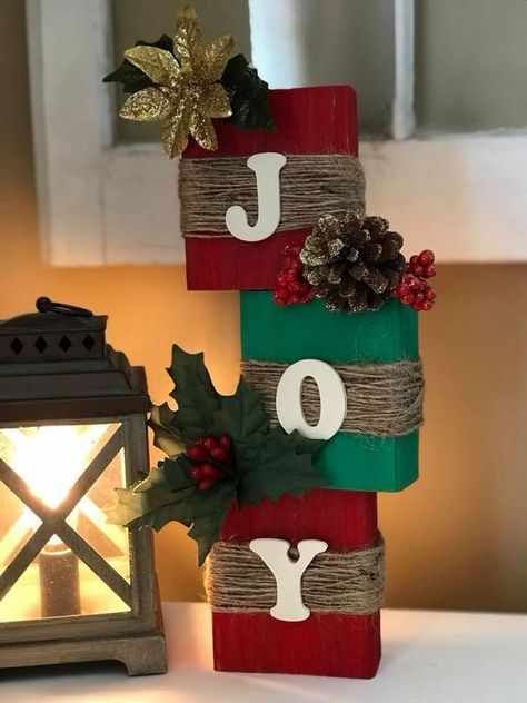 100+ DIY Dollar Tree Christmas Crafts that spells out Love, Hope & JOY - Hike n Dip Wooden Joy Sign Diy Christmas Wood Blocks, Christmas Decor Ideas Diy To Sell, Diy Wood Presents Decor, Wood Blocks Christmas Crafts, Jenga Block Crafts Diy Dollar Tree Truck, Christmas 2 X 4 Crafts, Simple Diy Home Decor Ideas Creative, Diy Christmas Decorations For Office Desk, Scrap 2x4 Projects Diy Christmas