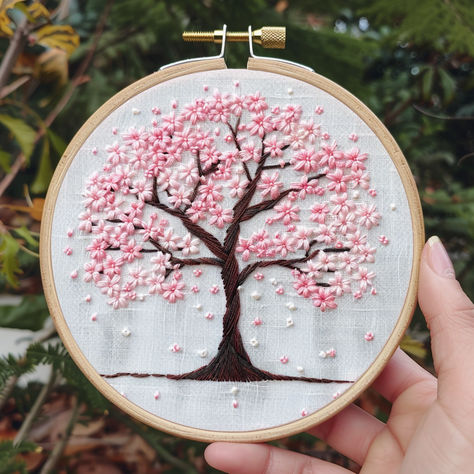 Experience the beauty of spring with this Cherry Blossom Tree Hand Embroidery Pattern! 🌺 This elegant design is perfect for nature lovers and embroidery enthusiasts of all levels. Create stunning hoop art featuring a cherry blossom tree in full bloom. 🌳 Instantly downloadable, this pattern makes embroidery stitching a delightful experience. Let’s stitch and bring this serene tree to life! #CherryBlossomEmbroidery #SpringCrafts #HandEmbroideryPattern #NatureLovers #DIYEmbroidery Cherry Blossom Tree Embroidery, Cherry Blossom Embroidery Pattern, Tree Hand Embroidery, Embroidery Forest, Cherry Blossom Embroidery, Embroidery Tree, Shop Painting, Clothes Embroidery, Garden Embroidery