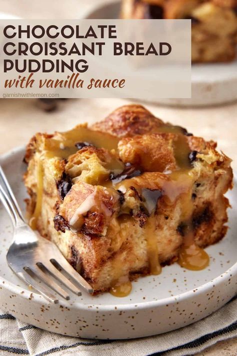 Buttery, flaky pastries make this easy, make-ahead Chocolate Croissant Bread Pudding with Vanilla Sauce stand out from the rest! Toasted croissant pieces are baked in a fragrant custard sauce, dotted with rich chocolate chunks and drizzled with a warm vanilla butter sauce for the ultimate comfort food dessert recipe. Chocolate Croissant Bread Pudding Recipe, Bread Pudding Cookies, Bread And Butter Pudding With Croissants, Crossaint Bread Pudding Desserts, Croissant Bread And Butter Pudding, Chocolate Bread Pudding Recipe Best, Bread Pudding Chocolate, Bread Pudding Croissant, Bread Pudding Savory