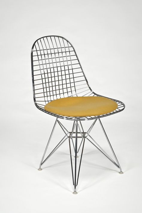 Artist/Designer: Charles and Ray Eames b. Charles 1907-1978, St. Louis Ray 1912 - 1988, Sacramento Title: Wire Side Chair with Seat Cushion (DKR) Medium: Chrome plated metal wire, upholstery Dimension Eames Furniture, Cardboard Chair, Mid Century Modern Interior Design, Famous Interior Designers, Wire Chair, Charles And Ray Eames, Top Furniture, Mid Century Modern Interiors, Eames Chairs