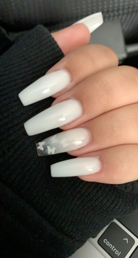 Acrylic Nails Acrylic Nails Ideas Milky White, Cloud White Nails Acrylic, Soft White Coffin Acrylic Nails, Ombre Nail Designs With Butterflies, White Butterfly Nails Acrylics, Milky White Nails With Butterflies, White Nails Butterflies, Basic White Nail Designs, Basic White Nails With Design