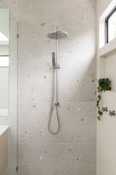 Contrary to popular belief, grey bathrooms are a wonderful opportunity to bring new life into your space. We explore the possibilities in our blog | ABI Interiors Build by: @pjhconstructions Building Design by: @bcgbuildingdesign Interior Design by: @our.next.project Styling: @connectedspacestyling 📸 by: @abiinteriors Grey Terrazzo Bathroom, Grey Bathroom Ideas, Light Grey Bathrooms, Terrazzo Bathroom, Abi Interiors, Window In Shower, Grey Bathroom, Bathroom Design Inspiration, Boys Bathroom