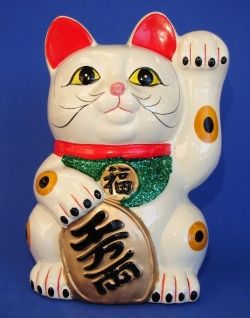 The white lucky cat statue with left hand (paw) up is used to attract wealth and good luck to home or business. The cat's right hand (paw) is holding the symbol of money to represent wealth. Chinese Jade Jewelry, Lucky Cat Statue, Chinese Cat, Porcelain Statue, Money Cat, Japanese Bobtail, Bobtail Cat, Daruma Doll, Neko Cat