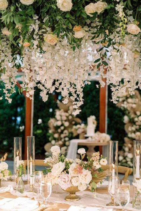 A floral install can make a dramatic impact to your reception space! Pair with candles to create the ultimate romantic feel. Simple Candle Centerpieces, Table Chandelier, Floral Installation, Easy Candles, Flower Girl Baskets, Floral Chandelier, Reception Flowers, Greenery Garland, Ceremony Flowers