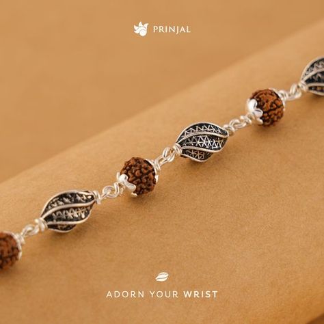 Feel the spirituality of Rudraksha and beautiful silver beads. Rudraksha Silver Marquise Beads Bracelet by Prinjal, Each Rudraksha bead holds spiritual significance, promoting positive energy and a sense of well-being. Shop this beautiful piece at www.prinjal.com Rudraksha Bracelet, Friendship Pictures, Boys Bracelets, Gold Jewels Design, Clever Captions, Rudraksha Beads, Antique Gold Jewelry Indian, Har Mahadev, Beading Jewelery