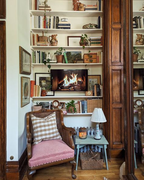 Books and decorative items in home library after renovation. Library Vibes, Dream Home Library, Cozy Studio Apartment, Cozy Library, Living Room Transformation, Build A Fireplace, Apartment Projects, Home Libraries, Living Room Bookcase