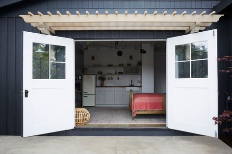 From Garage to Guest House: A Stylish ADU in LA by Allprace Properties Garage Into A Bedroom, House Flipper, Beveled Subway Tile, Flip House, House Flip, Backyard Cottage, House Flippers, House Garage, Carriage Doors