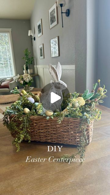 happy bash co on Instagram: "A fun afternoon activity! I have wanted a large centerpiece for our kitchen table but haven’t found one that I love that’s also worth the price tag so instead i gathered stuff i already owned - a basket and some Easter decor and then went to the craft store for greenery and a few Easter decorative stems and made my own! 

I did not glue the greenery all the way down to the basket so if i change my mind and want to use this again, it’ll be easy to remove! 

This was sooooo easy and so fun! I’m planning to make another fun mini arrangement for our small table as well. 

#easter #eastercraft #easteractivity #eastercenterpiece #easterparty #eastertable #easterbrunch #craft" Basket Centerpieces Table Party, Tabletop Baskets With Greenery, Picnic Basket Centerpiece, Change My Mind, Large Centerpiece, Rabbit Dolls, Easter Centerpieces, Small Table, Craft Store