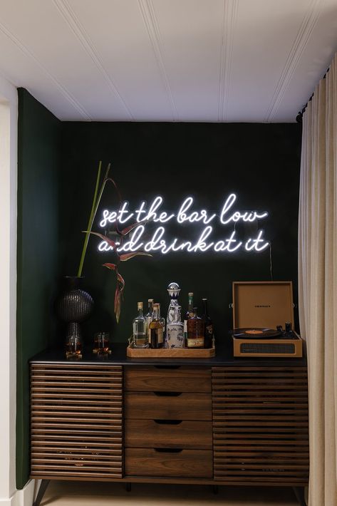 The best way to make a bar uniquely your own? Don it with a playful neon sign with your favorite quote. Points if the quote is an inside-joke between your friends & family. 🍸 Neon Sign Interior Design, Home Speakeasy Bar, Home Speakeasy, Studios Interior Design, Make A Bar, Karan Brar, Neon Signs Quotes, Green Accent Walls, Speakeasy Bar