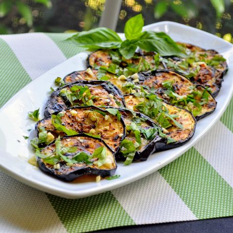 Eggplant is grilled with basil and parsley for this super easy Italian side dish! You can also serve this as a vegan appetizer. Works with zucchini as well. Italian Eggplant Recipes, Grilled Eggplant Recipes, Italian Side Dishes, Grilled Side Dishes, Easy Summer Side Dishes, Italian Dinner Party, Traditional Italian Dishes, Grilling Sides, Grilled Eggplant