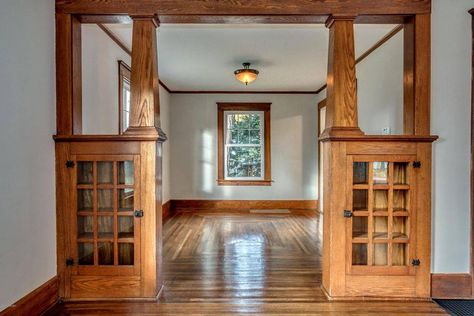 New Build Craftsman Style Interior, Craftsman Pillars Interior, Arts And Craftsman Style Interiors, Craftsman Style Built Ins Bookcases, Craftsman Built In Bookshelves, 1900s Craftsman Style Homes, Craftsman Room Divider, Craftsman Style Office, Craftsman Cottage Living Room