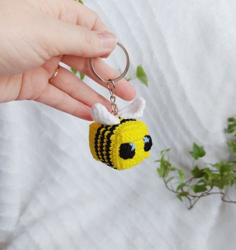 This is the Handmade crochet Bee keychain from the popular game Minecraft. It will be a great gift for fans of the game.All items are made in a clean, smokefree and petfree home!This cute baby toy is completely made of hypoallergenic materials!Safe for children!Size: lengtf: 2 inches (5cm) width: 1,6 inches (4cm)Materials: high quality yarn: 50% acrylic, 50% cotton holofiber fillerCare instructions:Hand washing in warm water ( 30 C or 86 F)Delivery:Shipping out worldwide within 23 business days Minecraft Bee Plush, Minecraft Crochet Patterns, Crochet Bee Keychain, Minecraft Crochet, Minecraft Bee, Bee Plush, Bee Keychain, Crochet Keychains, Crochet Bee