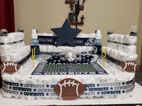 Dallas Cowboys diaper cake Dallas Cowboys Gender Reveal Ideas, Dallas Cowboys Baby Shower Ideas, Dallas Cowboys Nursery, Football Diaper Cake, Dallas Cowboys Birthday Cake, Dallas Cowboys Baby Shower, Cowboy Baby Shower Theme, 2nd Pregnancy, Cowboy Themed Birthday Party