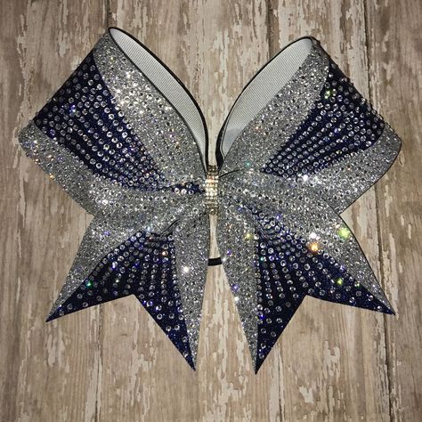 "This stunning bow is covered with over 1,700 crystals! It is shown in navy fabric with silver but is available in any color combo. Badda Bling Bows provides the highest quality bows on the market specializing in individual, practice and team bows and we uniform match. - FREE SHIPPING on all team orders. - Made with 3\" ribbon and premium nylon elastic hair bands that won't damage hair as they have no metal parts and are seamless. - Packaged and shipped in a box to ensure it arrives in perfect c Bling Cheer Bows, Bling Projects, Cute Cheer Bows, Cheerleading Ideas, Cheer Team Pictures, Competition Bows, Youth Cheer, Glitter Cheer Bow, Cheer Spirit