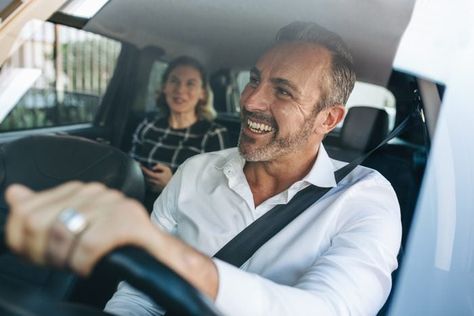 Your Uber driver notices some pretty personal things about you right away. Here's what you need to know about being a good rider and keeping your rating high. The post This Is What Your Uber Driver First Notices About You appeared first on Reader's Digest. Man Smiling, Woman In Car, African American Couples, Melbourne Airport, Uber Driver, Smiling Man, Taxi Driver, Taxi Service, Cute Cars