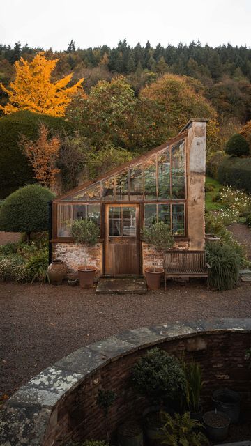 House With A Greenhouse, Spanish Greenhouse, Woodland Garden Design Layout, Large Greenhouse Ideas, Italian Greenhouse, Rustic Green House, Reclaimed Greenhouse, Stone Greenhouse, Cute Greenhouse