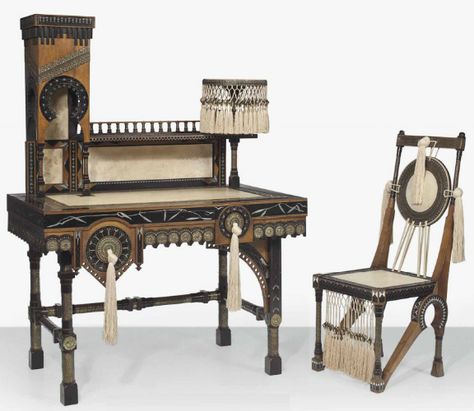 CARLO BUGATTI (1856-1940), desk and chair, c. 1900, mahogany, ebonized wood, brass, copper, pewter, parchment with tassels, Desk: 58½ in. (148.6 cm.) high, 42 5/8 in. (108.9 cm.) wide, 25½ in. (64.8 cm.) deep.; chair: 39 in. (99.1 cm.) high | SOLD $52,500 Christie's New York, Dec. 9, 2014 Carlo Bugatti, Ebonized Wood, Furniture Design Sketches, Art Nouveau Furniture, Furniture Details Design, Desk And Chair, Clock Decor, Italian Furniture, A Desk