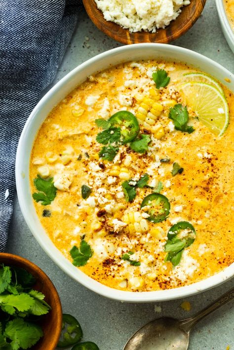 A creamy broth packed with sweet corn, roasted chicken and a subtle hint of spices for flavor, this chicken and corn soup is sure to win over friends and family! #elotesoup #mexicanstreetcorn #mexicanstreetcornsoup #souprecipe Elote Chicken Soup, Elote Chicken, Mexican Street Corn Soup, Street Corn Soup, Chicken And Corn Soup, Mexican Street Corn Recipe, Chicken And Corn, Street Corn Recipe, Corn Soup Recipes