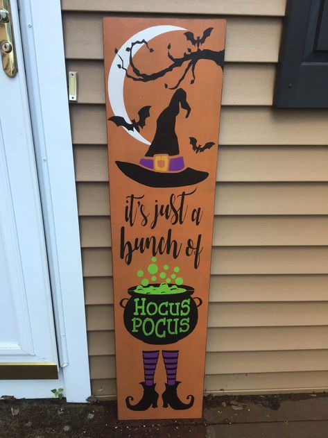 Bunch Of Hocus Pocus is a hand stenciled porch leaner Approximately 11.25 x 48 in. It has been stained and a black base coat and an orange top coat has been applied. It is then stained again and 2 coats of an exterior clear coat has been applied to enhance and protect the life of the sign. Frankenstein Porch Leaner, Hocus Locus Wood Sign, Hocus Pocus Welcome Sign, Nightmare Before Christmas Porch Sign, Halloween Porch Leaner, Hocus Pocus Decorations Diy, Hocus Pocus Porch Sign, Painted Halloween Signs, Stenciled Porch