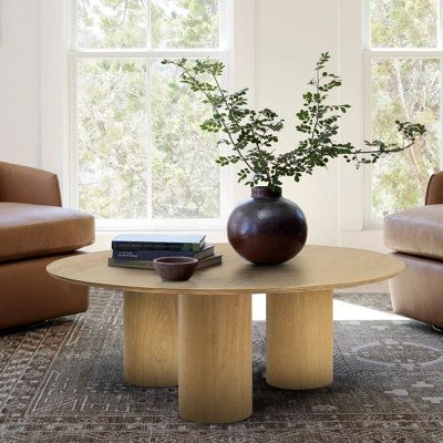 Crafted with genuine WHITE OAK! If you are looking for a low-profile round wood coffee table, this is the perfect choice for your low-lying couch! 16" height is lower to the ground, and the height is usually the same as the sofa's seating cushions. Placing short coffee tables in front of modern sofas and chairs will provide a practical storage surface without interrupting your line of sight, which makes your living room airier and bigger! 40" x 40'' is big enough to hold everything, the circular Round Black Coffee Table, Drum Coffee Table, Round Wood Coffee Table, Solid Coffee Table, White Oak Wood, Coffee Table Rectangle, Black Coffee Tables, Solid Wood Coffee Table, Small Coffee Table