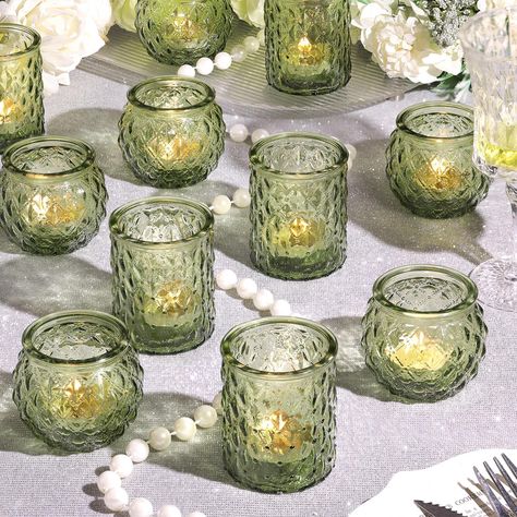 PRICES MAY VARY. Green Votive Candle Holders: The green candle holder features a sleek and elegant design with a smooth, translucent glass body in a vibrant shade of green.The green color of the glass creates a beautiful, calming effect when the candle is lit, casting a soft and gentle glow that adds a touch of warmth and ambiance to any space. About Size: NITIME green candle holder set is composed of two different size candle holders: 2.1"D * 2.6"H | 2.1"D * 2.1"H. The combination candle holder Christening Table Decorations, Green Tablescape, Cocktail Hour Decor, Green Bridal Showers, Green Candle Holders, Green Centerpieces, Bridal Shower Tables, Green Glassware, Tea Party Decorations