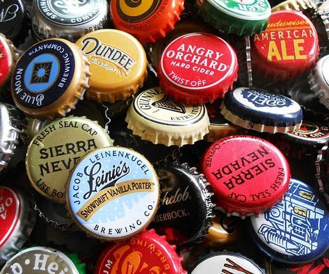 Give your beer cap collection a serious boost by purchasing this beer bottle cap variety pack. Each pack comes with an assortment of distinct brews from all over and of every shade, making them ideal to have on display in your man cave or bar. Beer Cap Coasters, Beer Cap Holder, Craft Beer Packaging, Beer Cap Art, Plastic Bottle Caps, Man Gifts, Beer Bottle Caps, Beer Art, Beer Bottle Cap