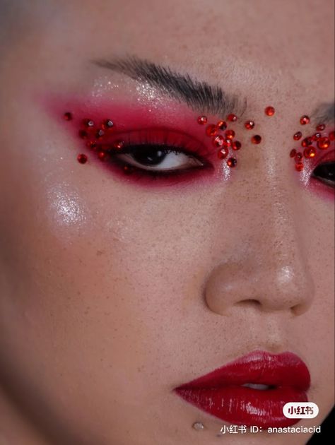 Black Smokey Eye With Gems, Korean Editorial Makeup, Red Dark Makeup Looks, Jewels Around Eyes, Creative Red Makeup Looks, Red Smokey Makeup, Smokey Red Makeup, Red And Black Smokey Eye Makeup, Red Party Makeup