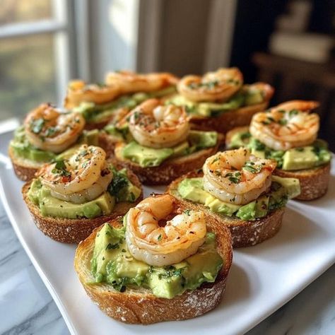 Nigella Lawson- Plate | Garlic Shrimp Crostini with Avocado—an elegant and delicious appetizer that's sure to impress | Facebook Cute Appetizers, Party Tapas, Shrimp Crostini, Wine Night Appetizers, Classy Appetizers, Wine Snacks, Crostini Appetizers, Shrimp Appetizers, Seafood Appetizers