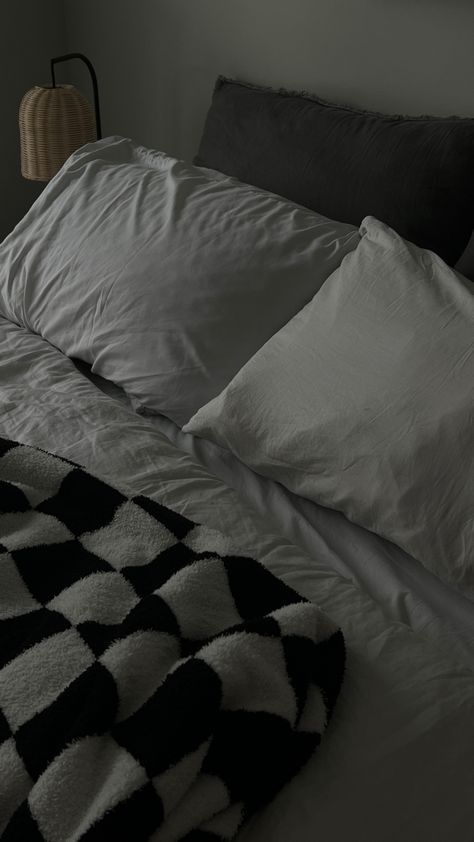 white bedspread, big grey pillows, white sheets, checkered blanket, home, bedroom, aesthetic, dark edit, cozy Black Bed Sheets Aesthetic, Grunge Bed Sheets, Checkered Bedding Aesthetic, Black Sheets Aesthetic, Bed Spreads Aesthetic, Black Grid Bedding Aesthetic, Bedroom Grey Bed, Bed Sheets Aesthetic Dark, Black And White Bed Sheets Aesthetic