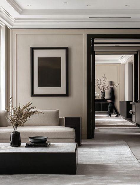 🏙️✨ Discover the art of minimalist living in this elegant New York apartment! With soft beige walls and sleek black accents, the space radiates sophistication. A large window floods the room with natural light, creating a warm, inviting atmosphere. 💡☀️ The modern sofa is perfectly paired with a single framed artwork, making a stylish statement. 🖼️💖 The marble coffee table, adorned with fresh fl... Tv Wall Classic Design, French Apartment Interior, French Apartment, White Sofa, Apartment Chic, Modern Minimalist Living Room, New York Apartment, Soft Beige, Beige Walls