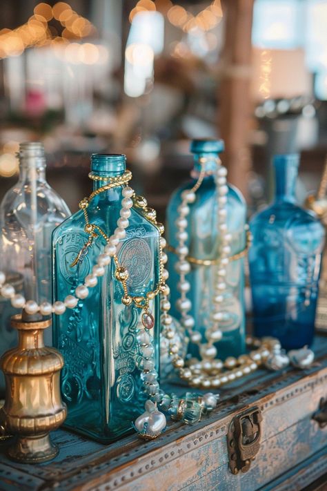 Dive into matrimonial bliss with our unique collection of nautical-themed wedding centerpieces. Think treasure chests filled with shimmering accents and bottles that whisk you away to the ocean's edge 🌊💍 Create a magical and adventurous tablescape that will enchant your guests. #WeddingInspiration #NauticalWedding #WeddingCenterpieces #TreasureDecor #BeachWeddingIdeas #RomanticWedding #UniqueWedding #TableDecor Mermaid Theme Wedding, Nautical Wedding Centerpieces, Tropical Christmas Decorations, Ocean Wedding Theme, Underwater Wedding, Nautical Candles, Underwater Party, Pirate Wedding, Themed Wedding Decorations